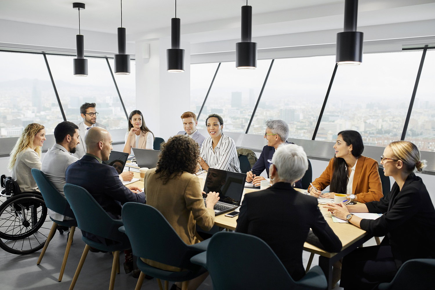Business professionals collaborating around a meeting table
