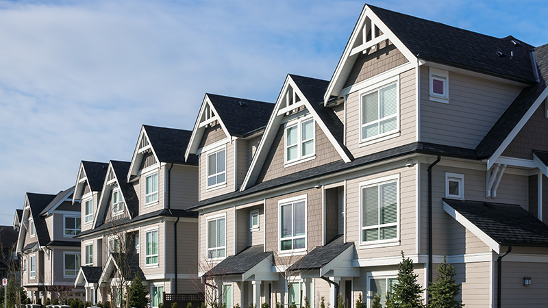 Row of houses with blue sky