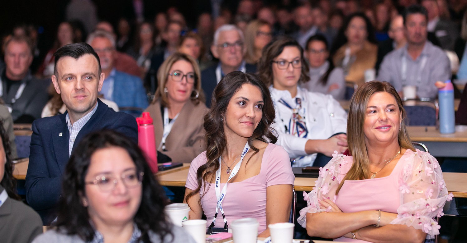 Room of people attending a learning session