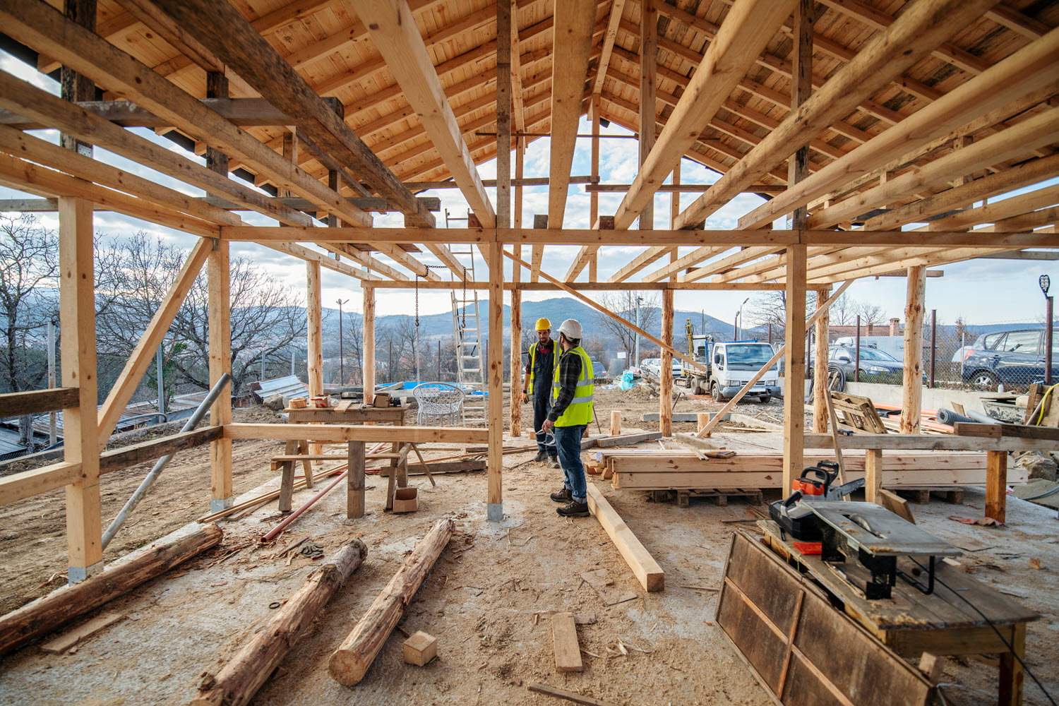 Two men building a home