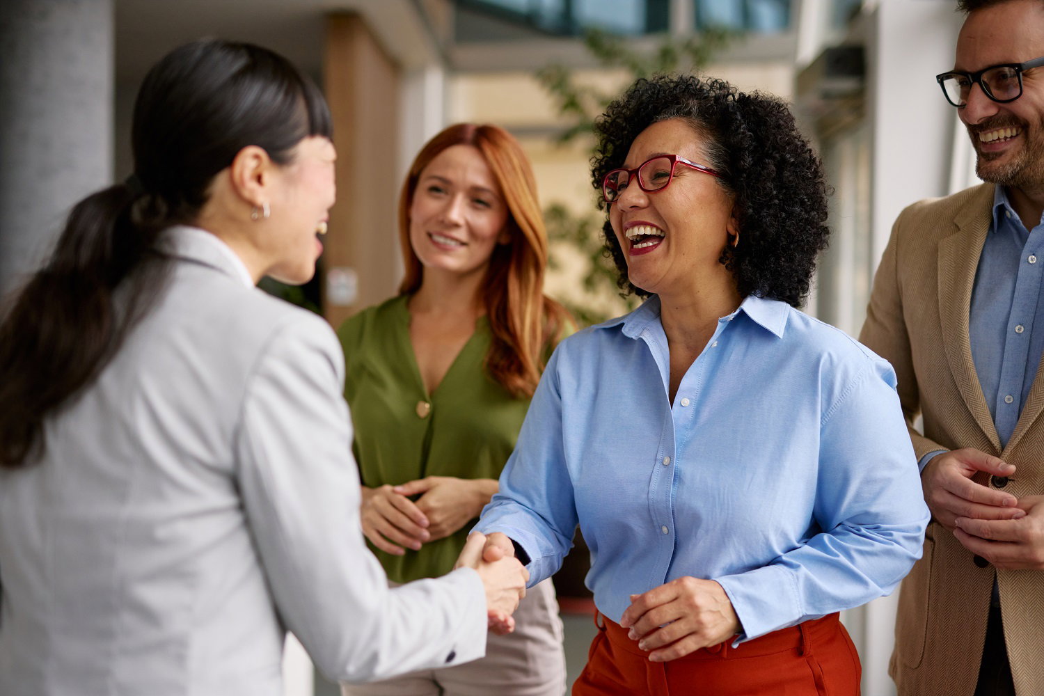 Aspiring mortgage professionals networking as they begin their careers.